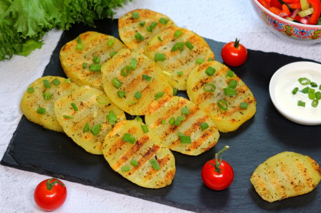 Grilled potatoes in a frying pan