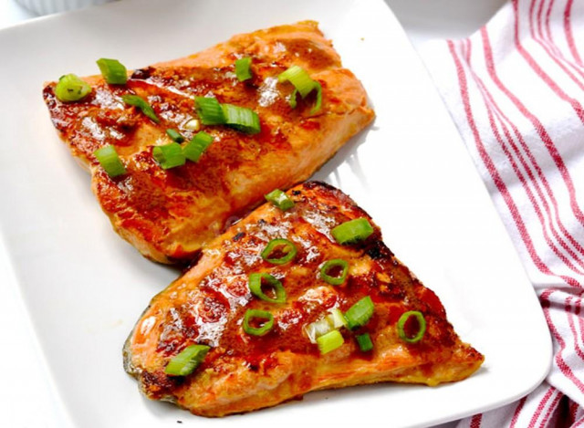 Grilled red fish in a frying pan