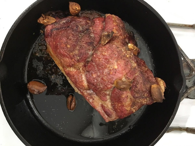 Pork shoulder in a frying pan