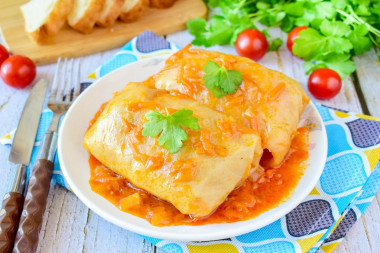 Frozen cabbage rolls in a slow cooker in tomato sauce