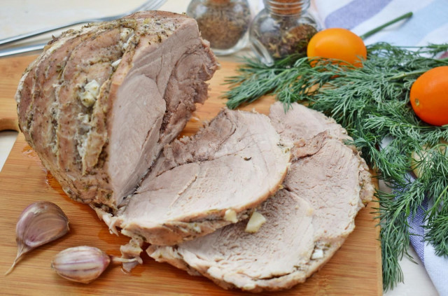 Pork baked in foil in a slow cooker