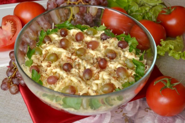 Layered eggplant salad with chicken and tomatoes