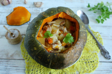 Meat with potatoes in pumpkin in the oven