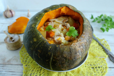 Meat with potatoes in pumpkin in the oven