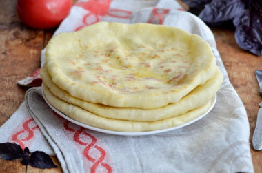 Khachapuri stuffed with pickled cheese without greens