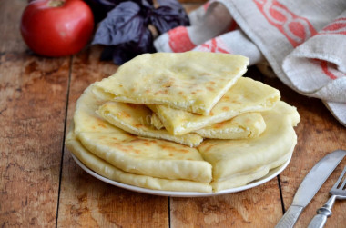 Khachapuri stuffed with pickled cheese without greens