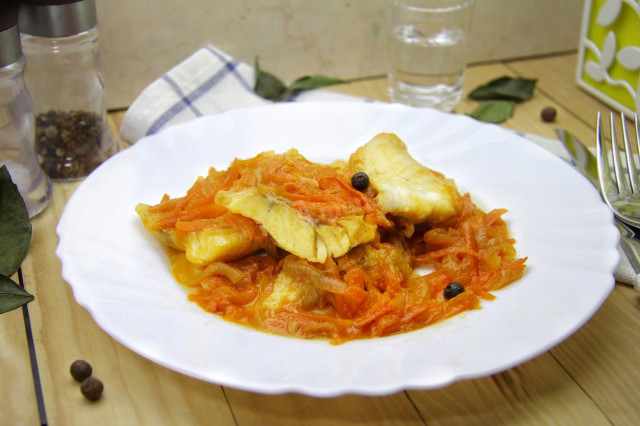 Fillet cod stewed in tomato paste with vegetables