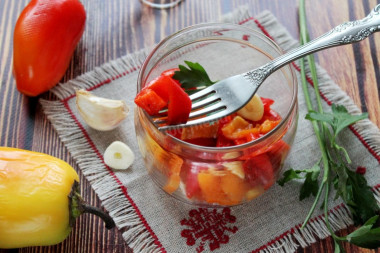 Baked peppers marinated with garlic for a snack