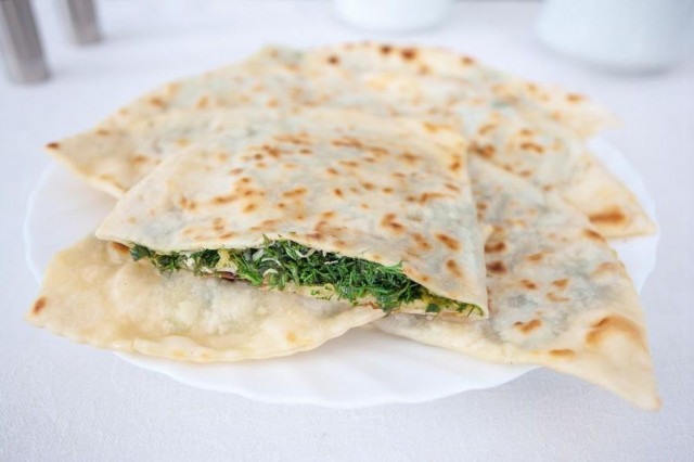 Cottage cheese tortillas with dill, parsley and onion