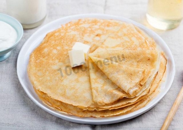 Thin pancakes with eggs in sour milk