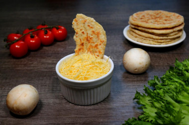 Cheese tortillas with milk in a frying pan
