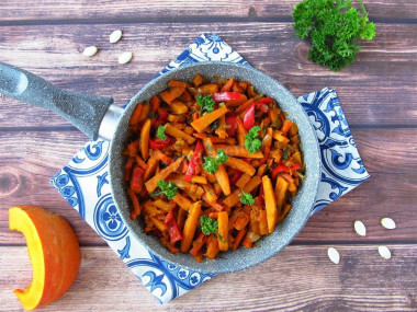 Pumpkin in a frying pan with vegetables