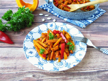 Pumpkin in a frying pan with vegetables