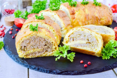 Zucchini roll with minced meat in the oven