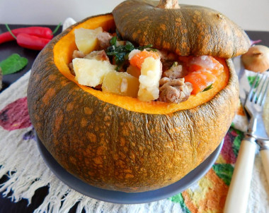 Stuffed pumpkin baked in the oven