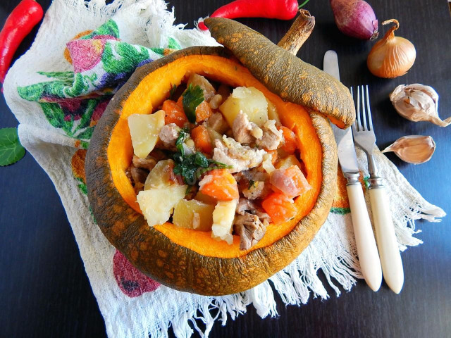 Stuffed pumpkin baked in the oven