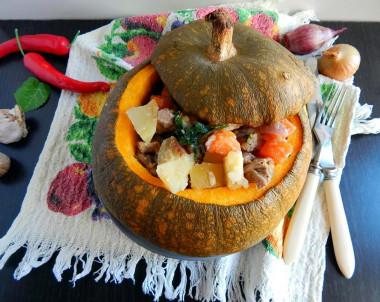 Stuffed pumpkin baked in the oven