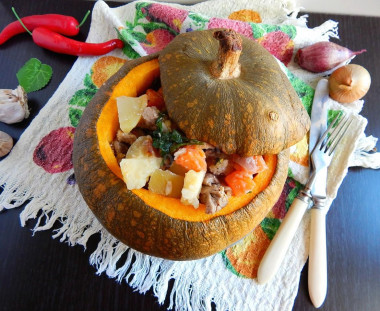 Stuffed pumpkin baked in the oven