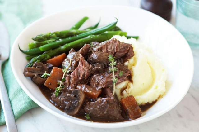 Beef cheeks in a slow cooker