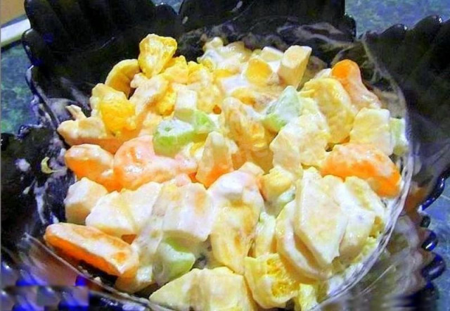 Fruit salad with tangerines and ice cream
