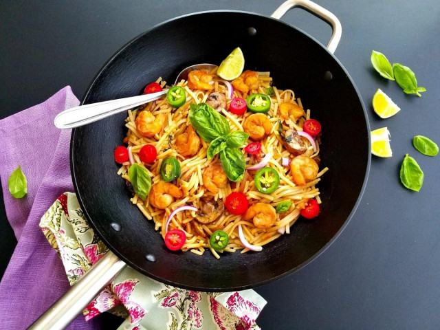 Vegetables wok with noodles, mushrooms and shrimp
