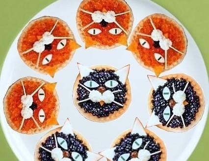 Tartlets with black and red caviar
