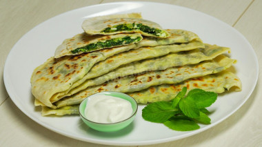 Kutabs with herbs and Adyghe cheese