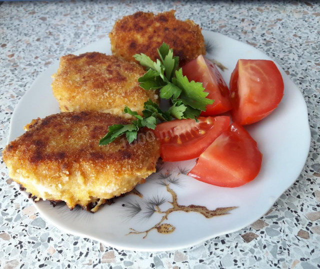 Pollock fish cutlets with carrots and with a bow
