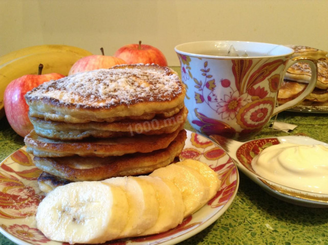 Pancakes with apples and bananas on kefir