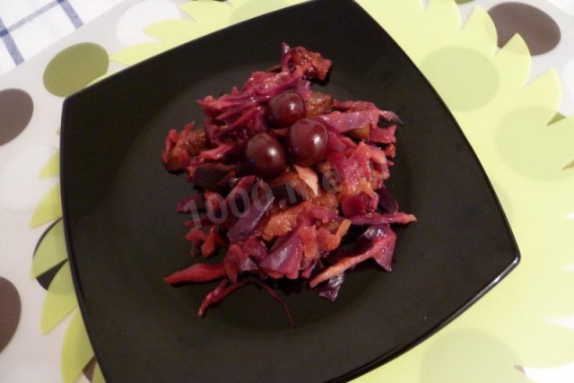 Plum and cherry salad of blue cabbage without salt