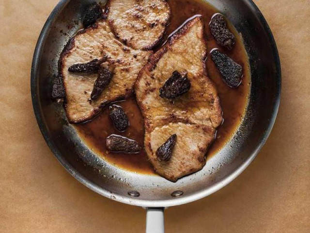 Beef chops in a frying pan