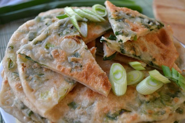 Placinda with herbs in a frying pan