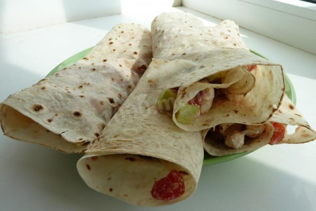 Salad in pita bread with feta cheese