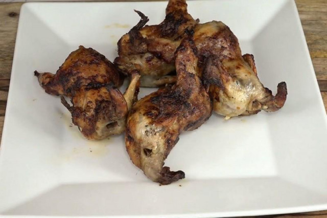 Quail on a spit in honey marinade