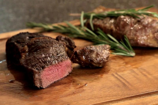 Marbled beef steak on a grill pan