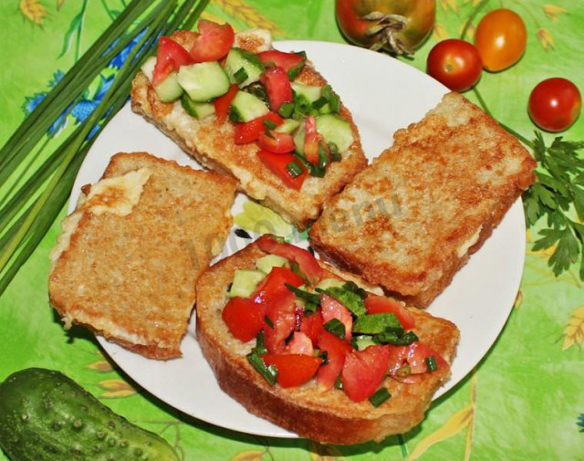 Bread in milk with egg in a frying pan