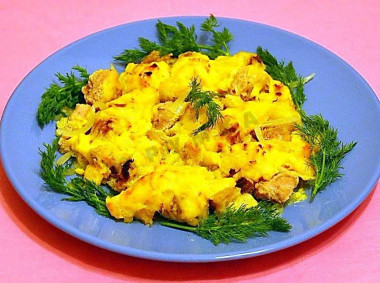 Pork with oranges and cheese in the oven