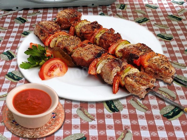 Soft shish kebab in pork wine on coals