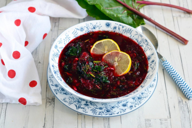 Classic cold borscht with boiled beetroot and tops