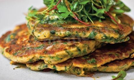 Green pancakes with sour cream