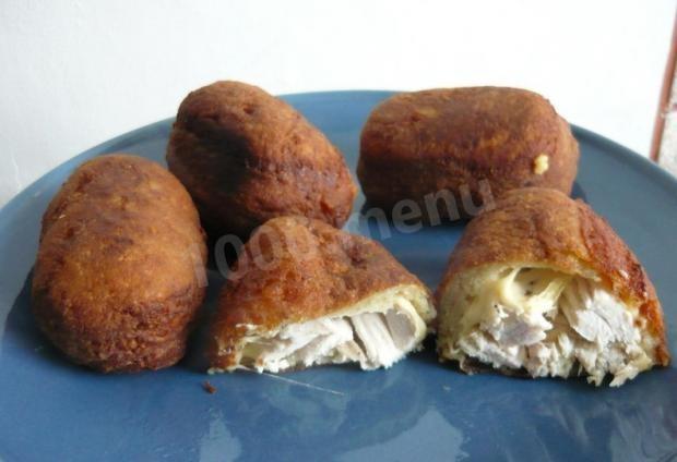 Potato pies stuffed with chicken and cheese