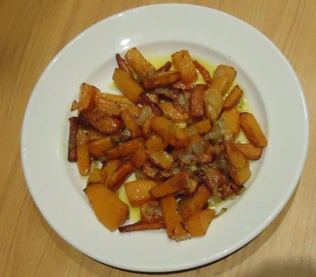 Wonderful pumpkin fried with onions and carrots