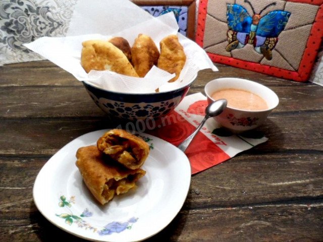 Delicious fried pies with porcini mushrooms on sour milk