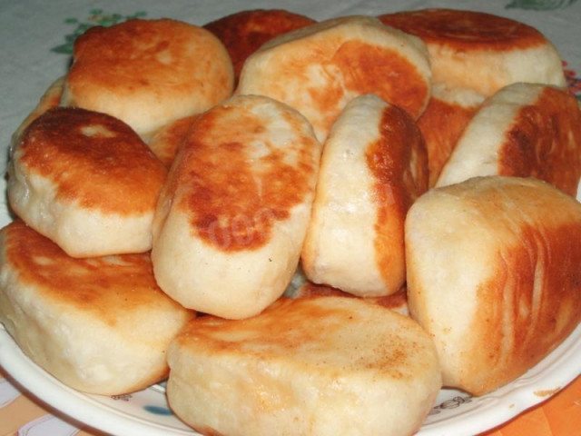 Fried milk dough pies with potatoes