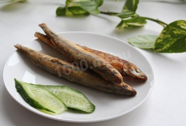 Smelt fried in vegetable oil in egg and flour