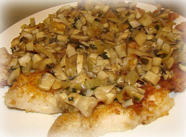 Fried fish with mushrooms