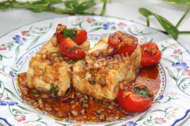 Fried tofu in soy-sesame sauce with cherry and garlic