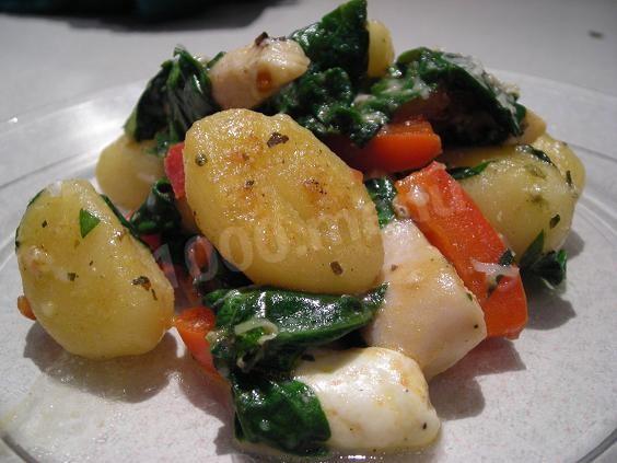 Fried gnocchi with greens and white beans