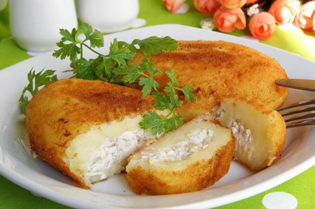 Potato pies with pickled mushrooms and cheese