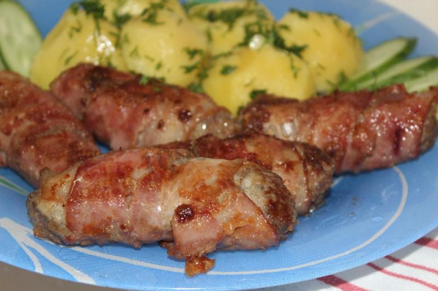 Chevapchichi sausages in bacon